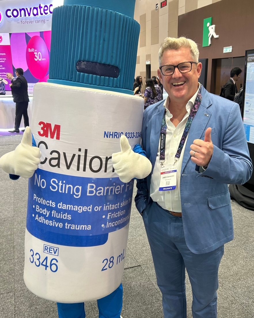 James Saunders, Founder and Principal Consultant, Med Dev Services, at WUWHS 2026 with the 3M Cavilon mascot